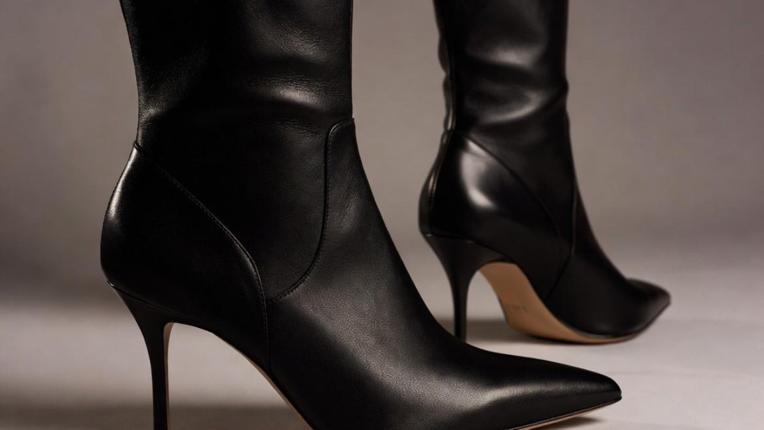 Black stiletto heel boots with cushioned insole and centered heel.